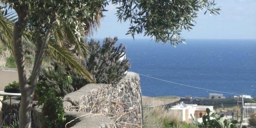 Забронировать Santorini Houses For Rent
