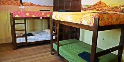 Забронировать La Casona de Lobitos Surf Hostel