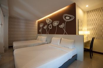 เดอะ โคซี่ เนสท์ บูติกรูม เกสท์เฮาส์ (The Cozy Nest Boutique Rooms Guest House)